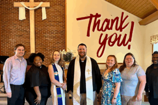 Bethel pastors at the front of the sanctuary. Text: Thank you!