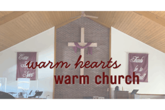 Front of Bethel sanctuary. Text: warm hearts, warm church