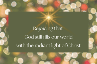 Text arranged in the shape of a Christmas tree with a star on top: Rejoicing that God still fills our world with the radiant light of Christ.