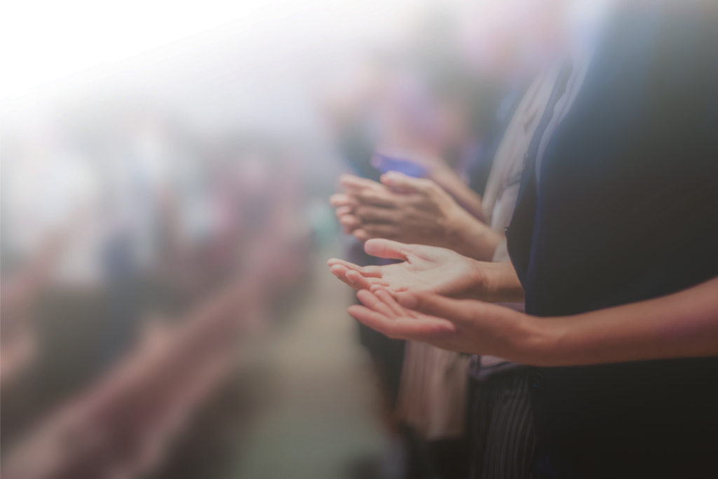 Hands held palms up in worship posture
